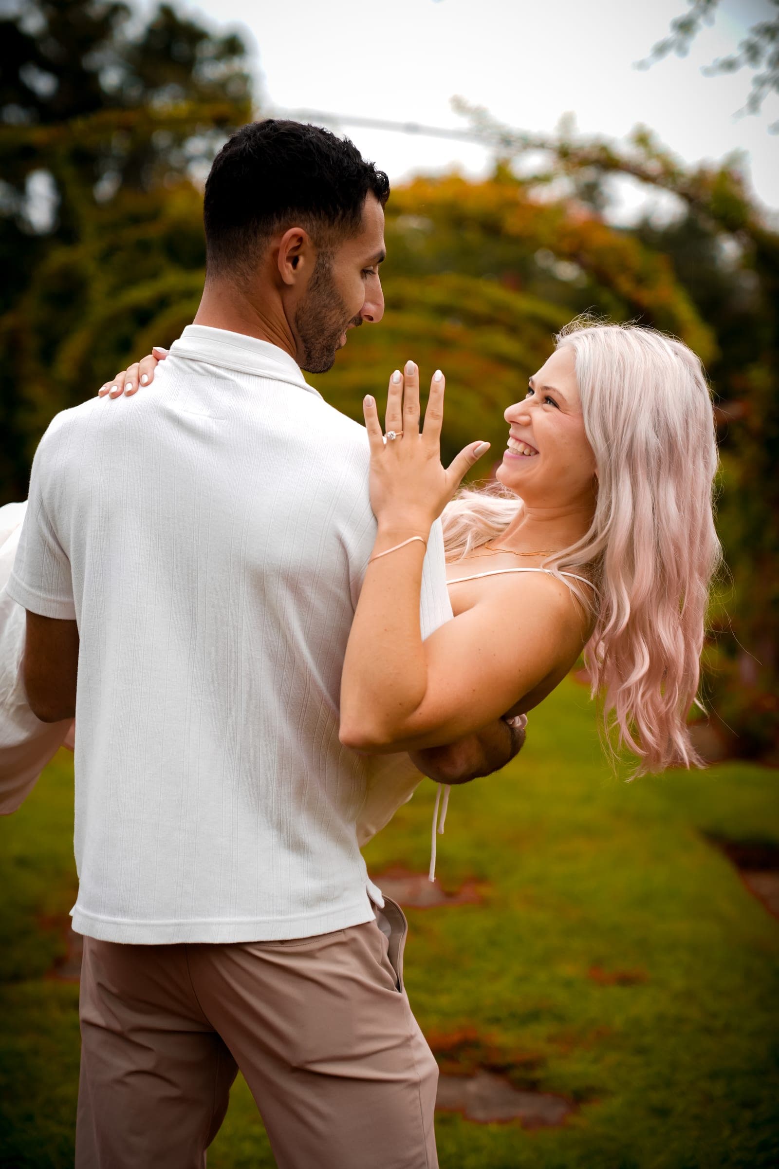 Couple facing each other in the garden